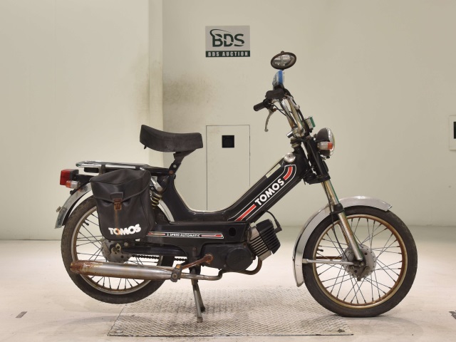 Tomos