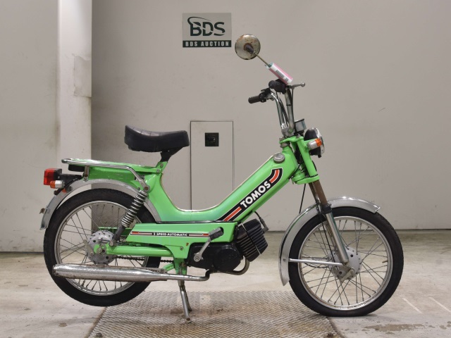 Tomos